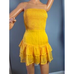 Fashion Nova XL Yellow Strapless Lace Up Romper NWT Smocked Tiered Ruffle Shorts